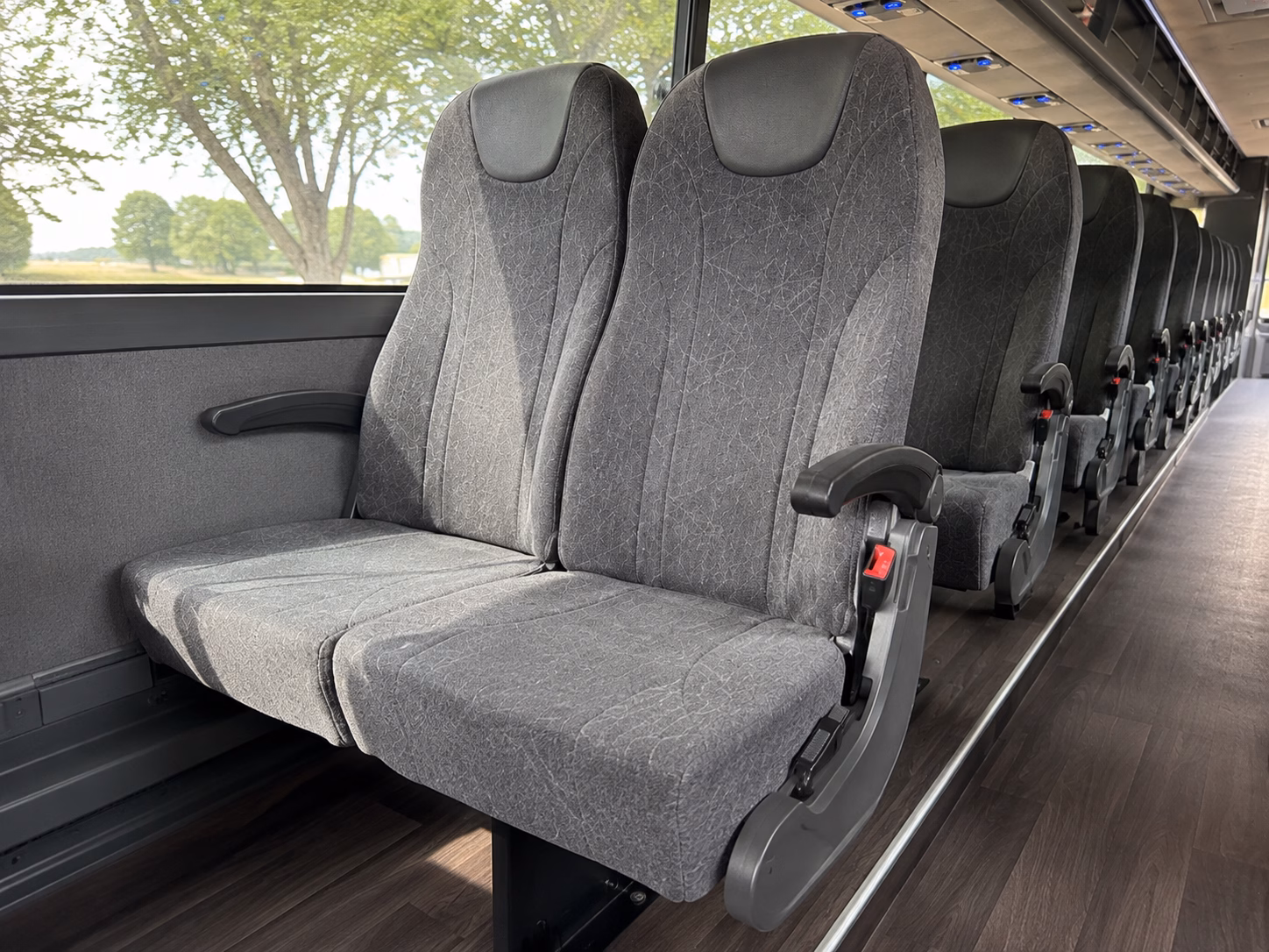how trip duration and booked hours affect charter bus rates in cambridge